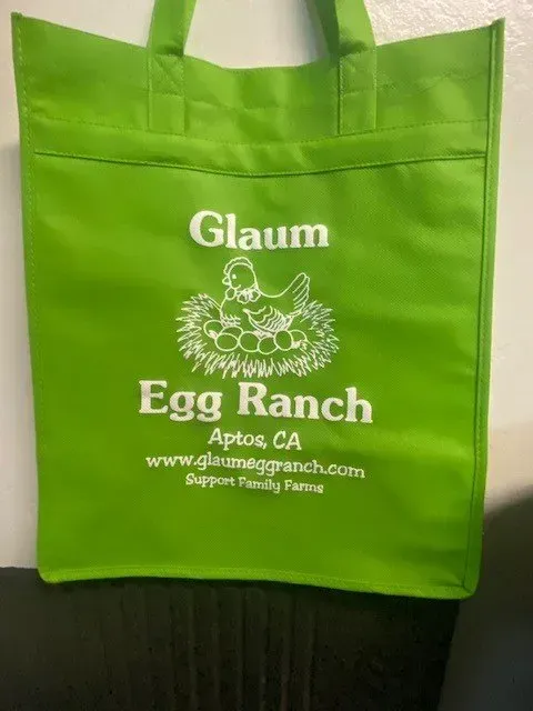 A T-shirt with a Logo on it is Being Printed on a Machine, Soquel, CA, Sport About Graphics